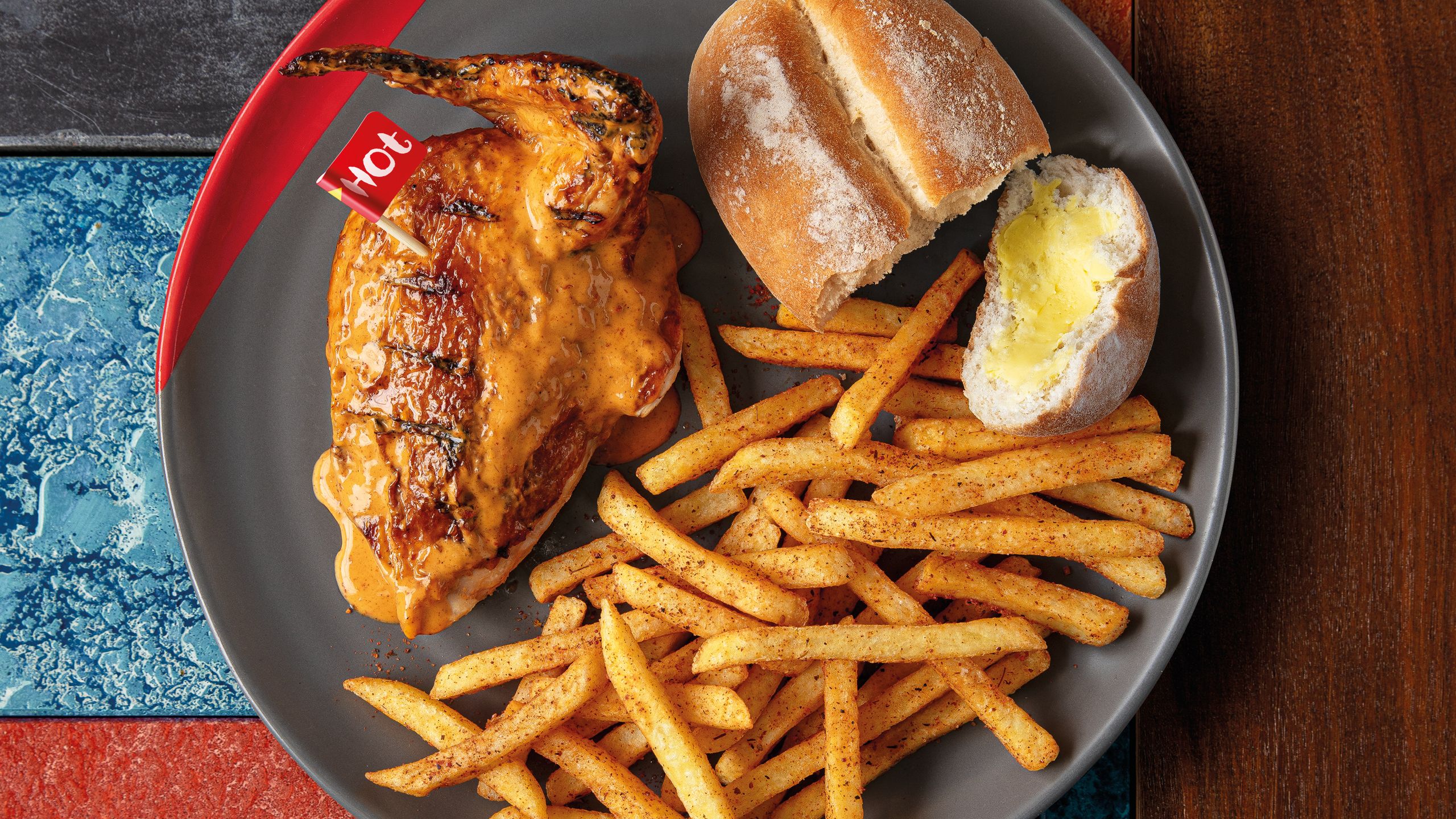Nando's | ¼ Chicken, Single Chips & Nando's Roll Meal